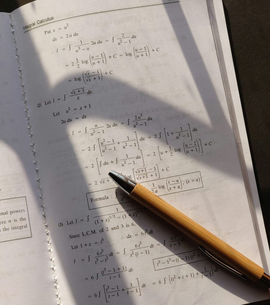 mathematics, math, a paper with math written on it and a pen
